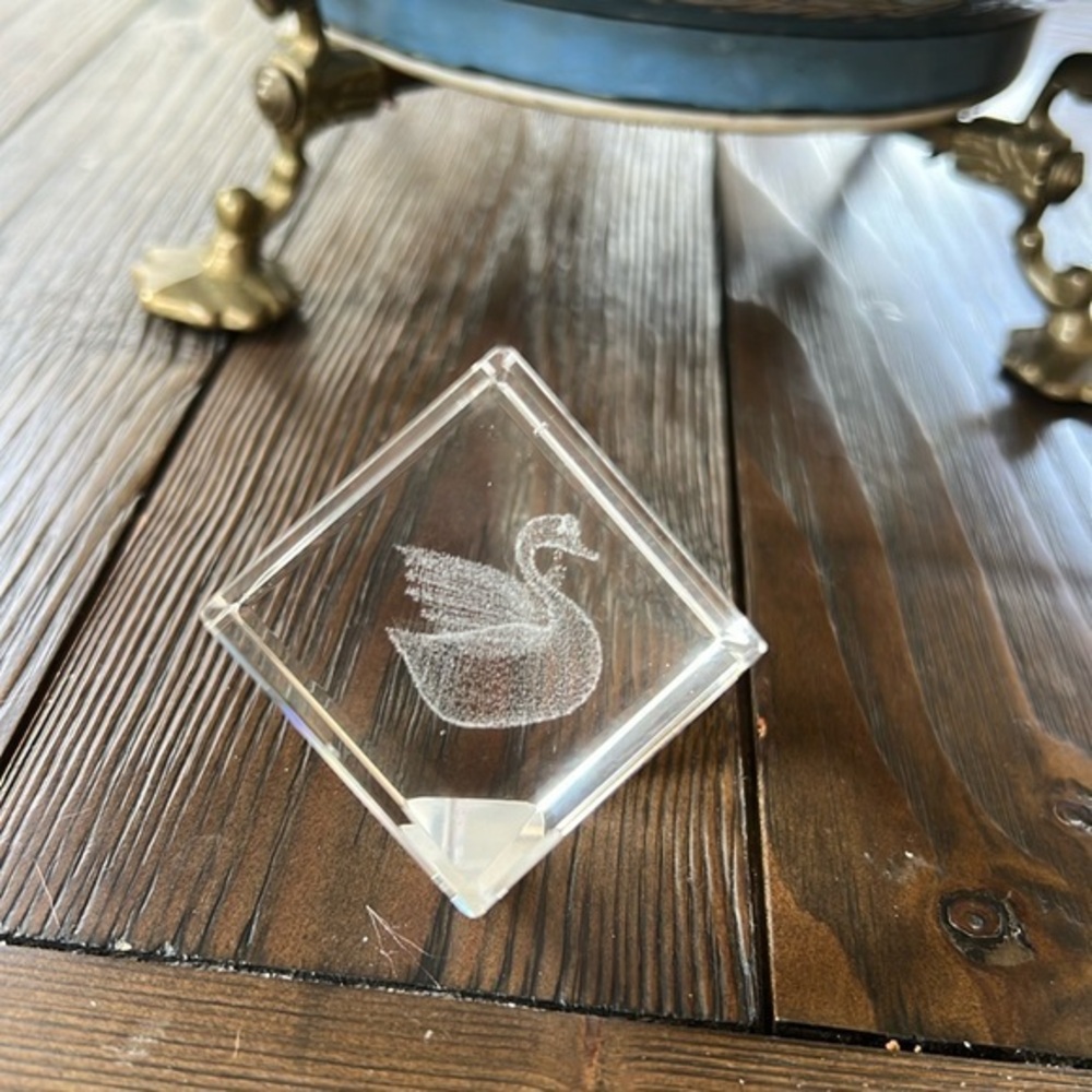 Glass cube paperweight with laser etched swan inside